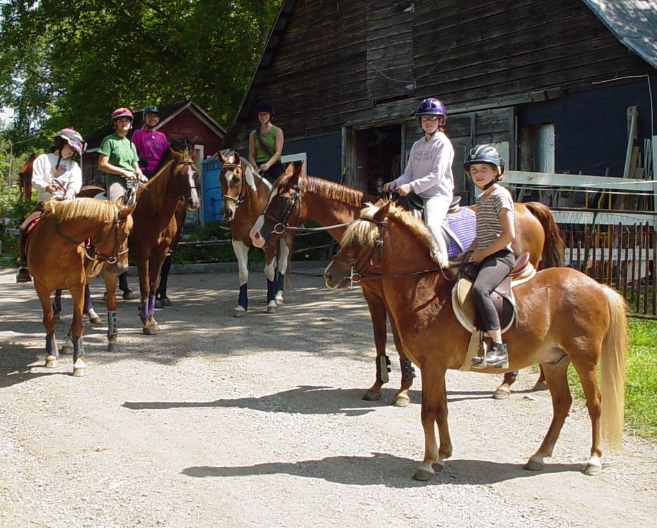 Summer campers at TWF heading out on a trail ride (-: