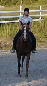 Vi's grangdaughter Heather enjoying a ride on Regalo